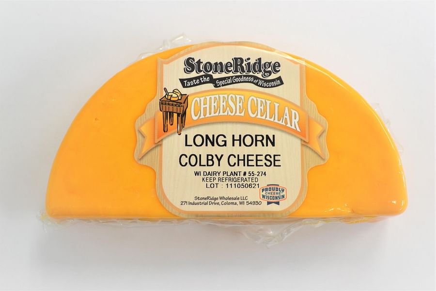 Close-up view of Colby cheese highlighting its texture and color
